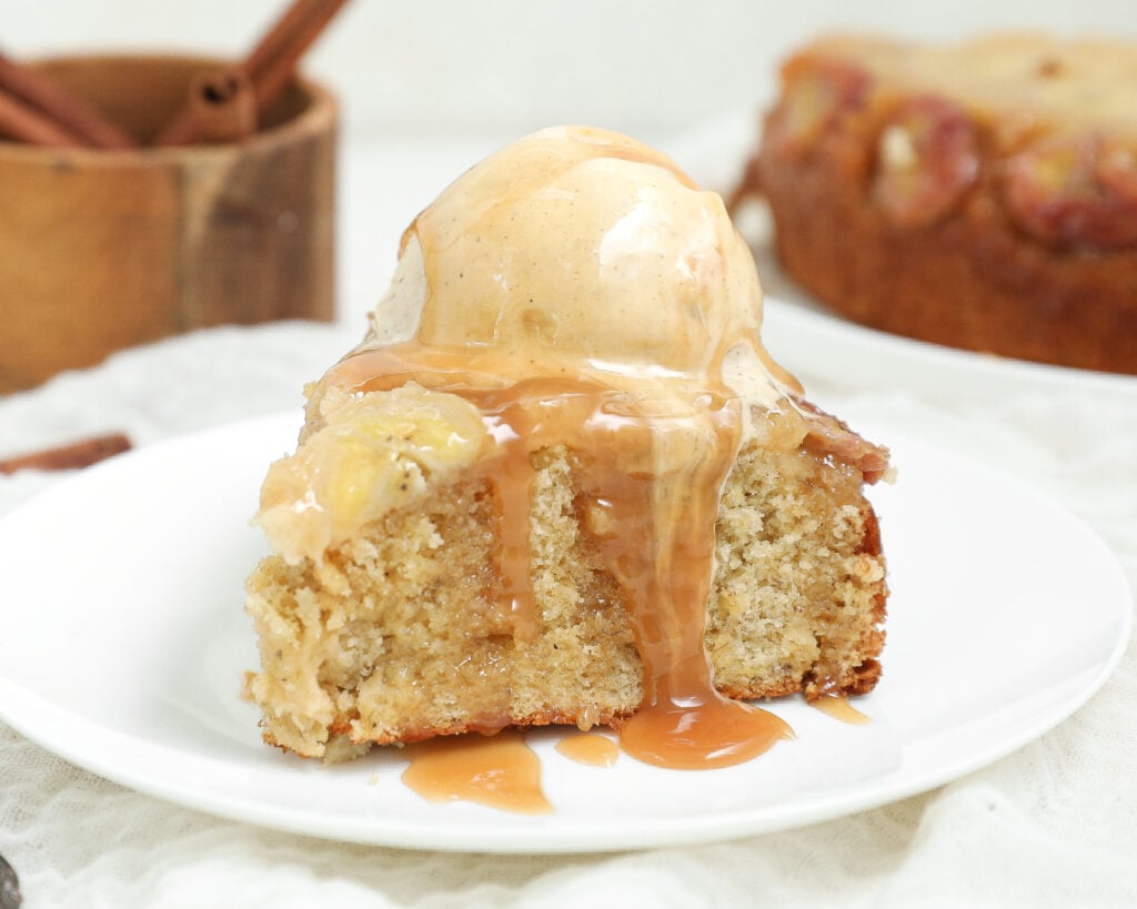 Banana Caramel Upside Down Cake topped with caramelized banana slices and drizzled with caramel sauce.