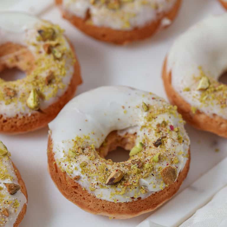 Cranberry Orange Donuts with White Chocolate Glaze