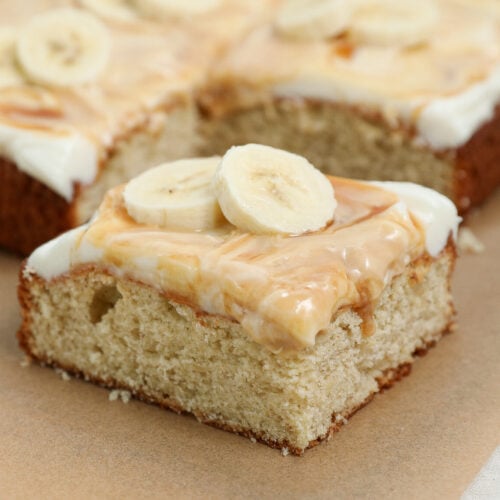 Honey banana cake with cream cheese frosting, honey drizzle, walnuts and fresh banana slices