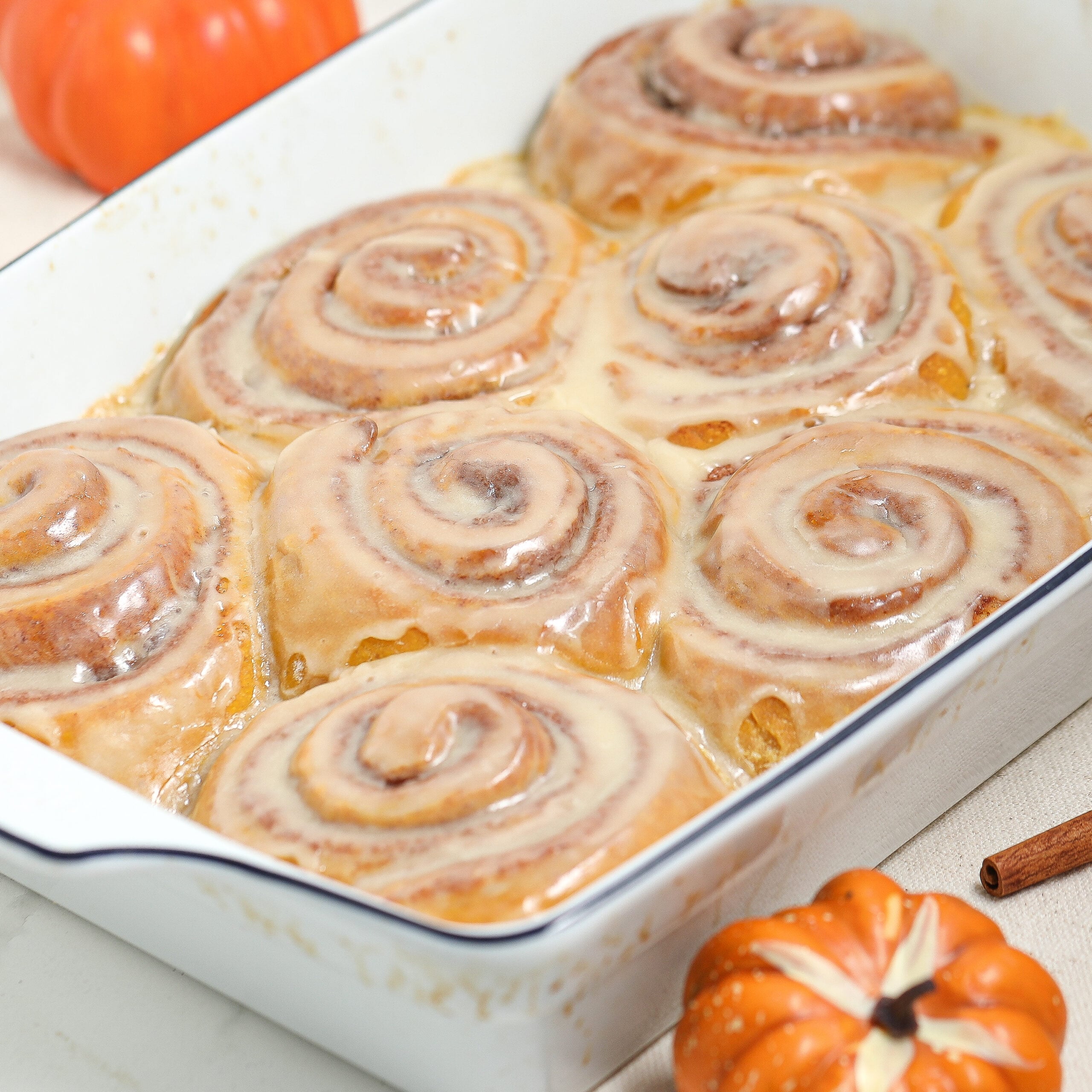 Pumpkin Cinnamon Rolls with Maple Cream Cheese Frosting