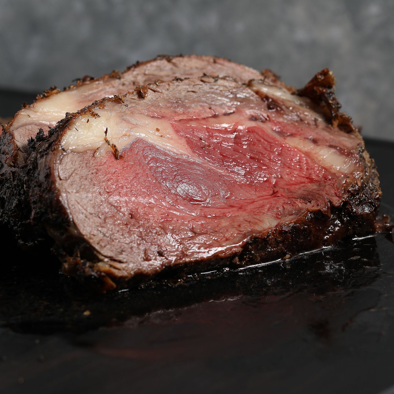 Prime Rib with Roasted Garlic Parmesan Cream Sauce - The Salty Cooker ...