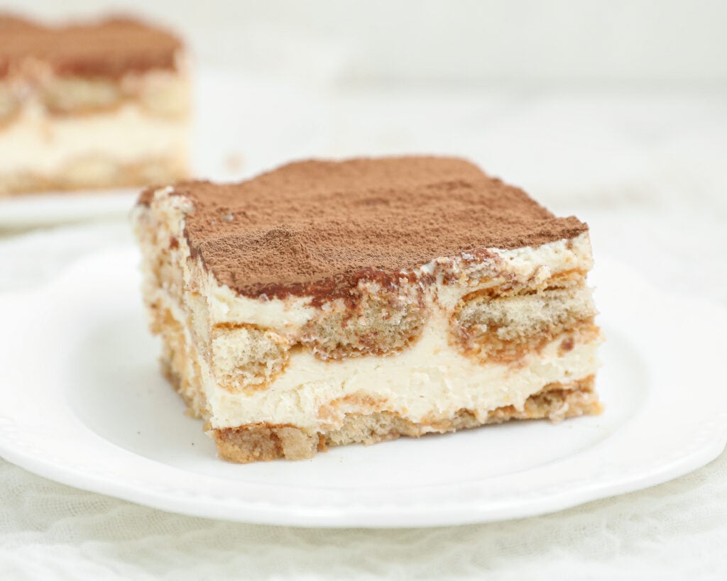 Easy tiramisu with layers of coffee-soaked ladyfingers, mascarpone cream, and cocoa powder