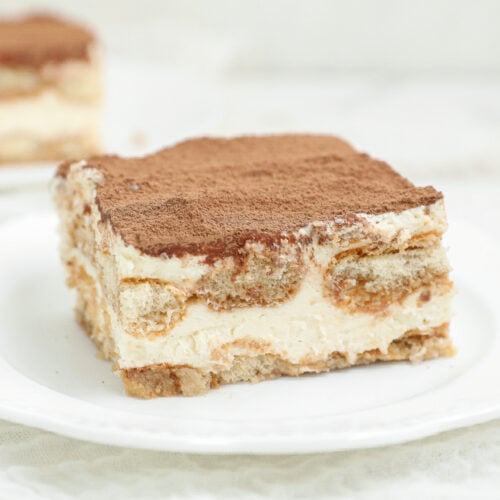 Easy tiramisu with layers of coffee-soaked ladyfingers, mascarpone cream, and cocoa powder