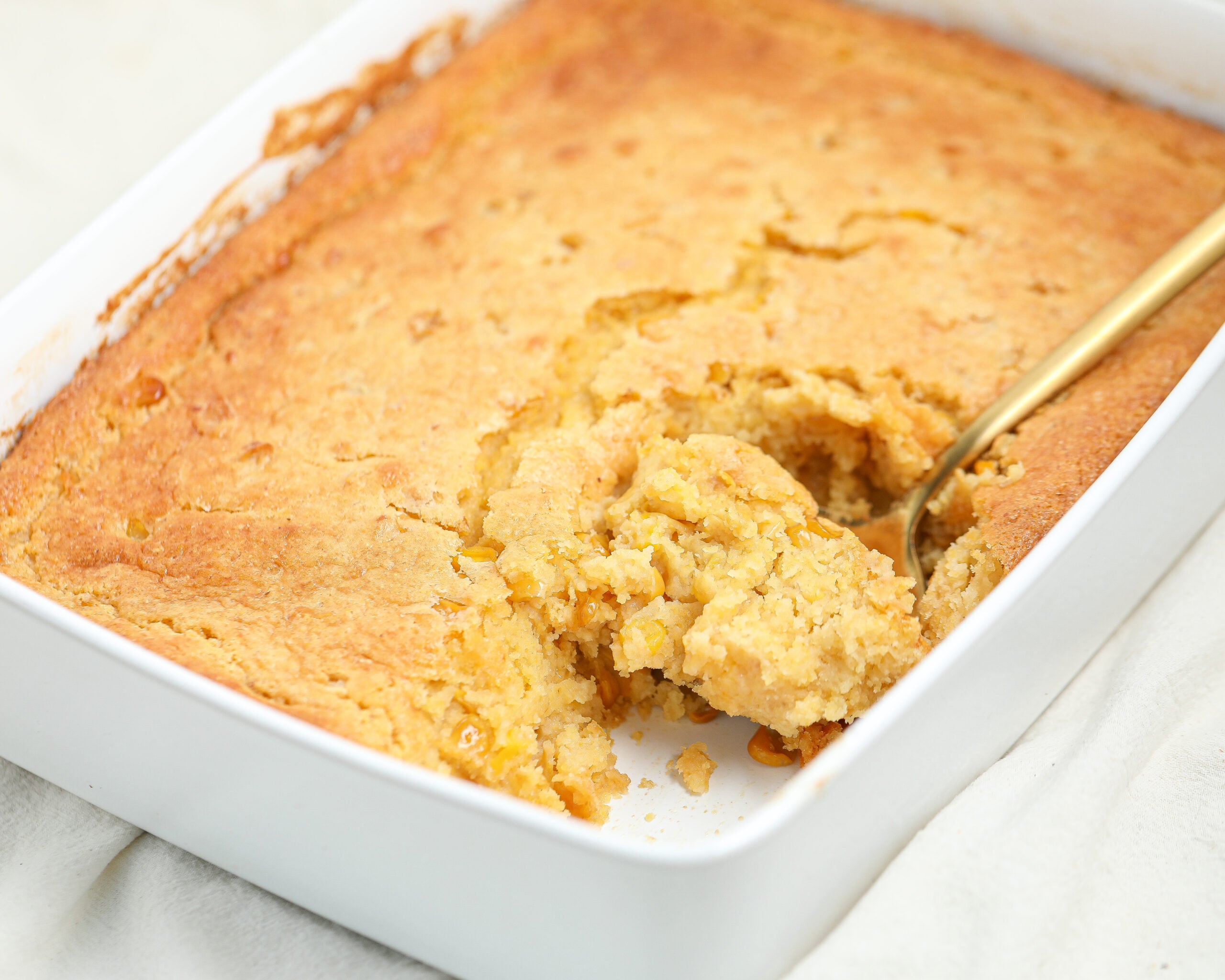 This easy Corn Pudding Recipe is creamy, buttery, and perfectly sweet — the ultimate holiday side dish made with cornbread mix, creamed corn, and sour cream for a soft, golden bake everyone will love.