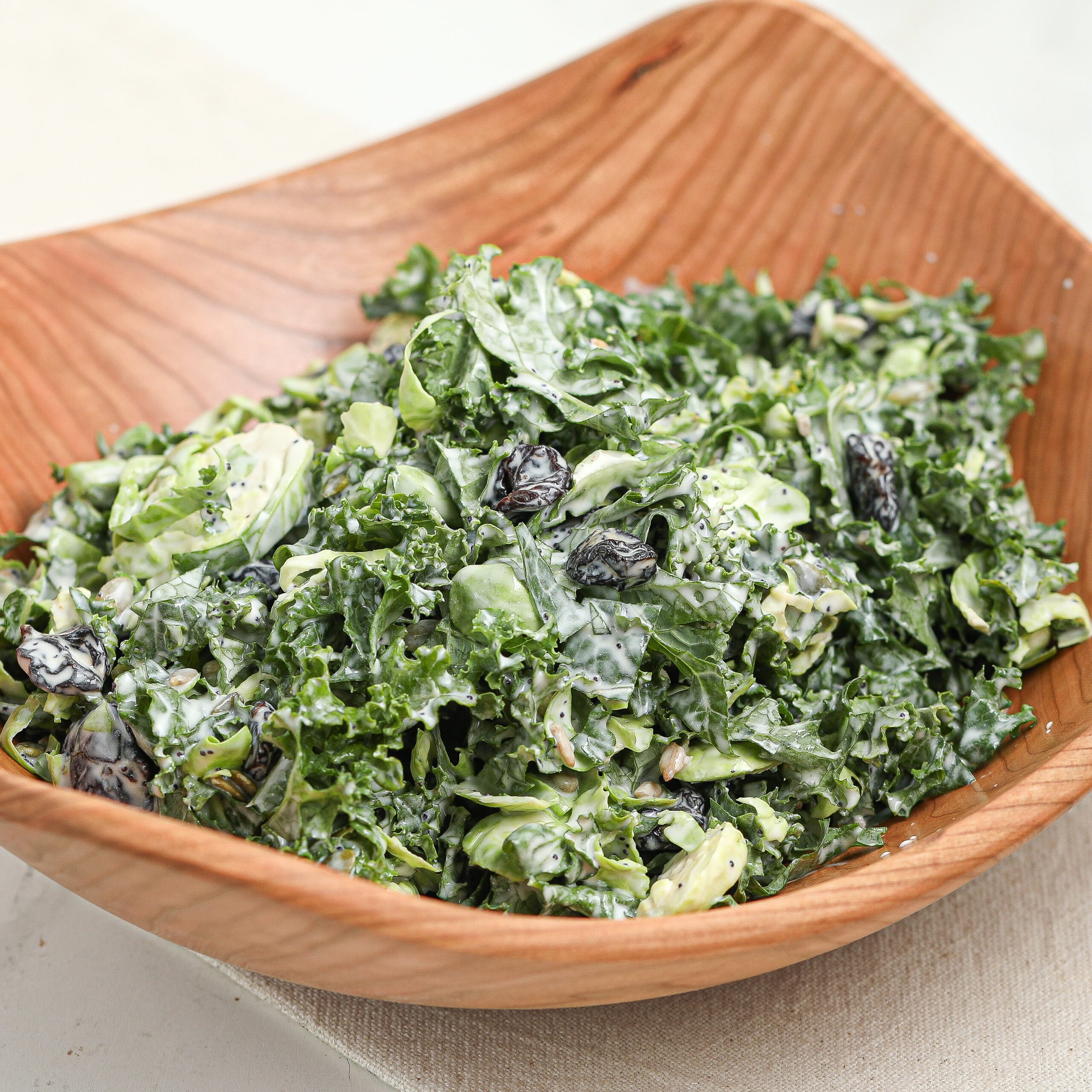 Kale and Brussels Sprout Salad with Lemon Poppy Seed Dressing