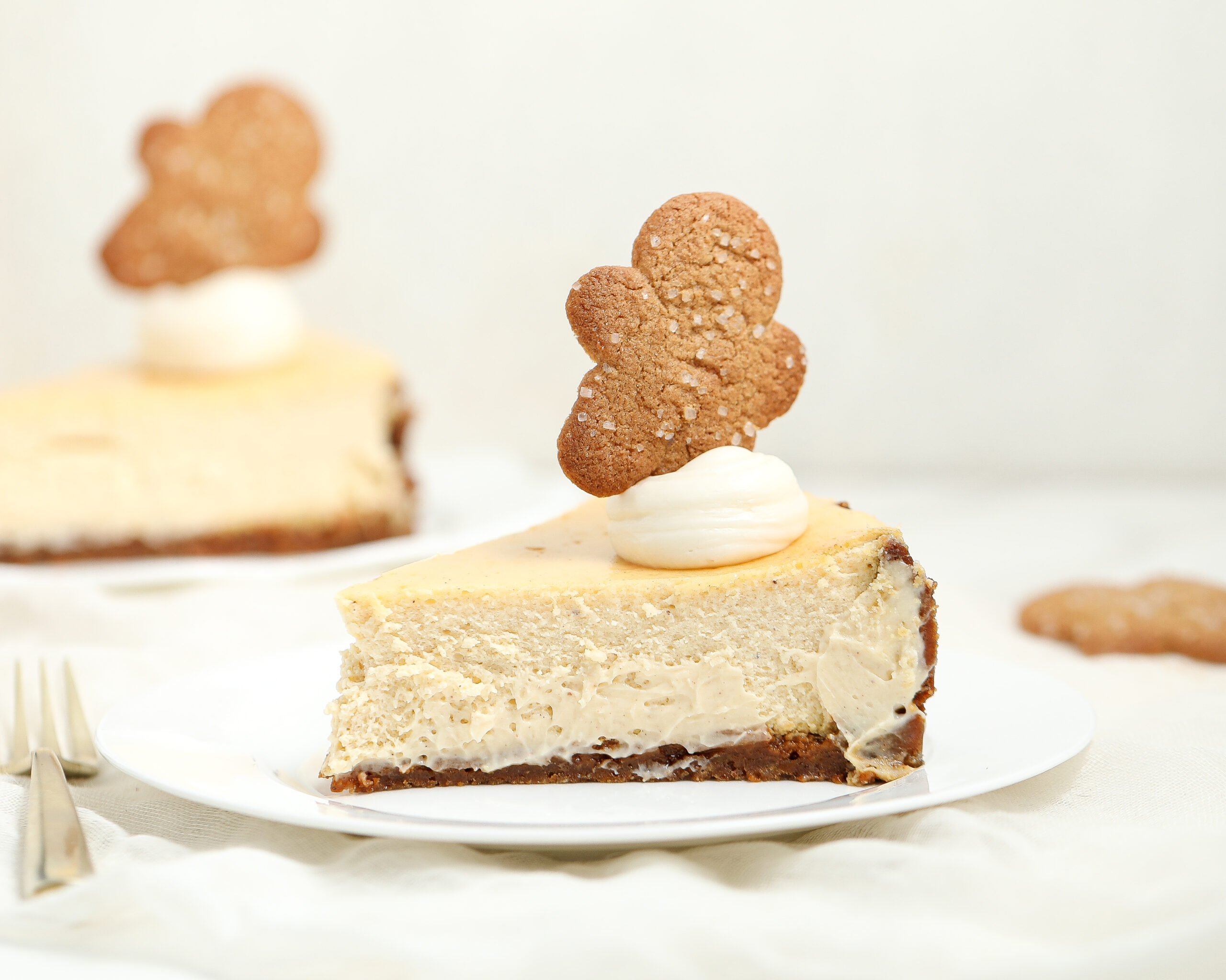 My favorite holiday cheesecake — silky eggnog filling, buttery gingerbread crust, and all the cozy flavors of December in one easy dessert.