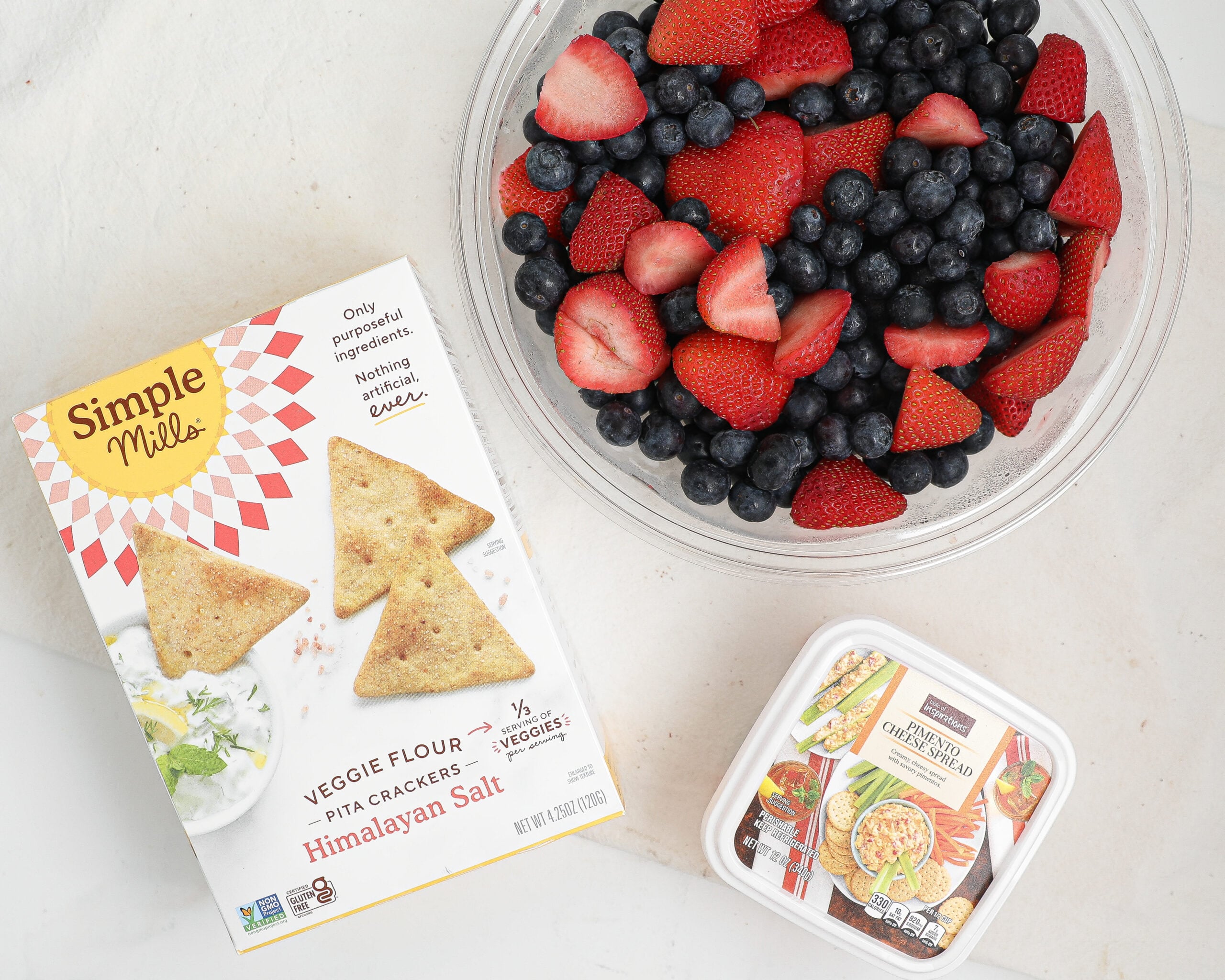 Food Lion beach snacks with fresh fruit, Simple Mills crackers, and ready-made pimento cheese spread