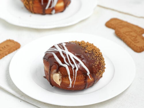 Biscoff cream filled doughnut topped with cookie butter, white chocolate, and crushed Lotus Biscoff cookies.