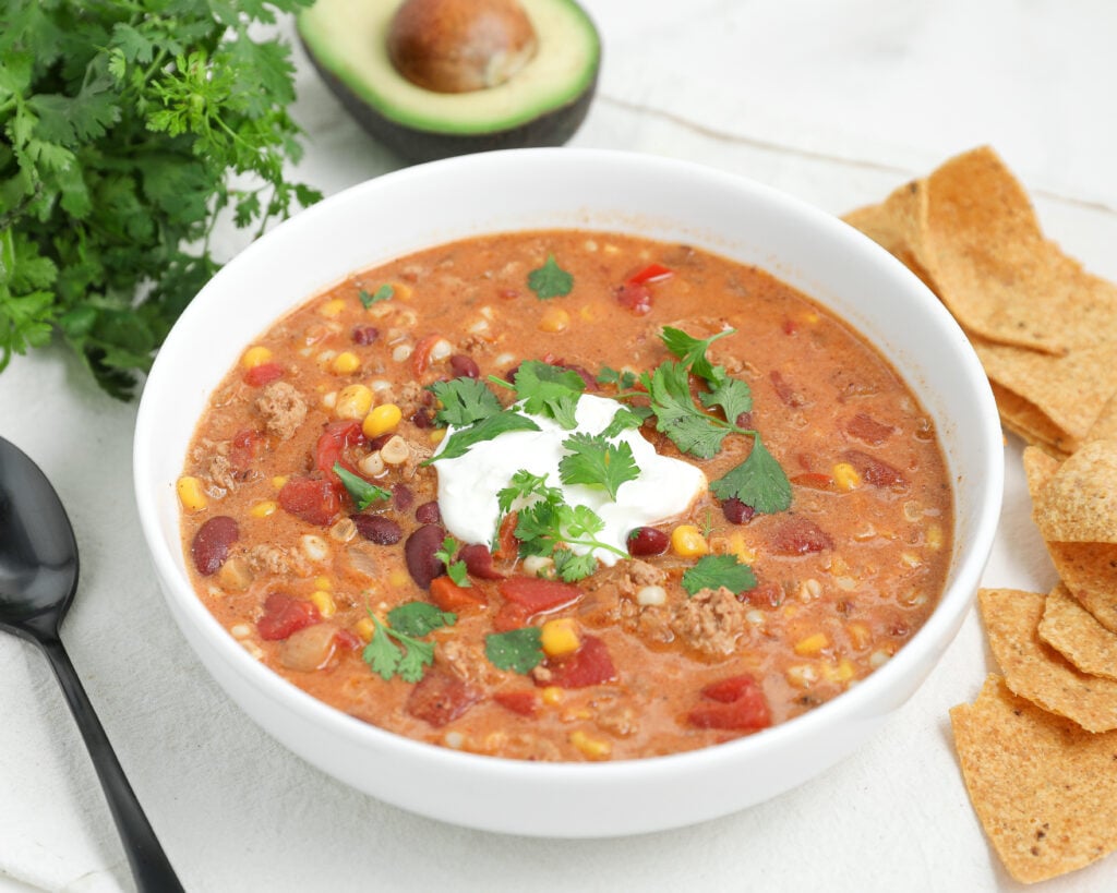 Mexican Street Corn Chicken Chili is a creamy one-pot chili made with ground chicken, corn, tomatoes, sour cream, and bold spices.