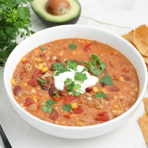 Mexican Street Corn Chicken Chili is a creamy one-pot chili made with ground chicken, corn, tomatoes, sour cream, and bold spices.
