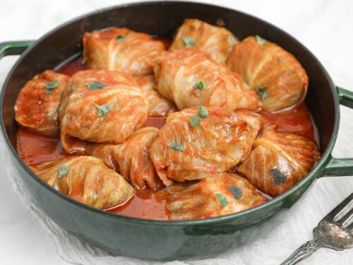 Bloody Mary cabbage rolls stuffed with beef, pork and rice baked in a savory tomato sauce.