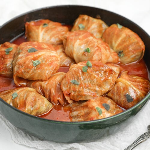 Bloody Mary cabbage rolls stuffed with beef, pork and rice baked in a savory tomato sauce.
