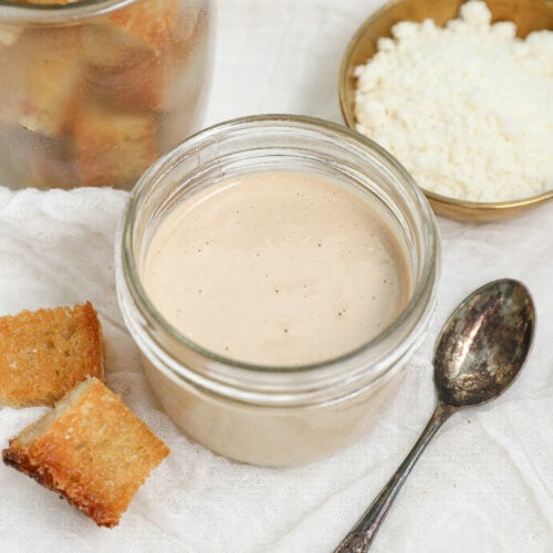Creamy eggless Caesar dressing made without raw eggs or anchovies served with Parmesan and croutons.
