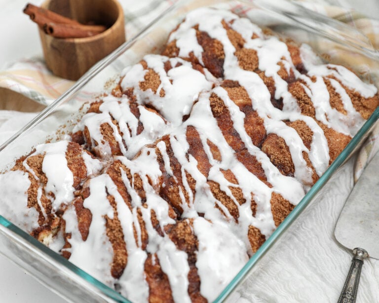 No roll banana bread cinnamon rolls with cinnamon sugar topping and cream cheese frosting